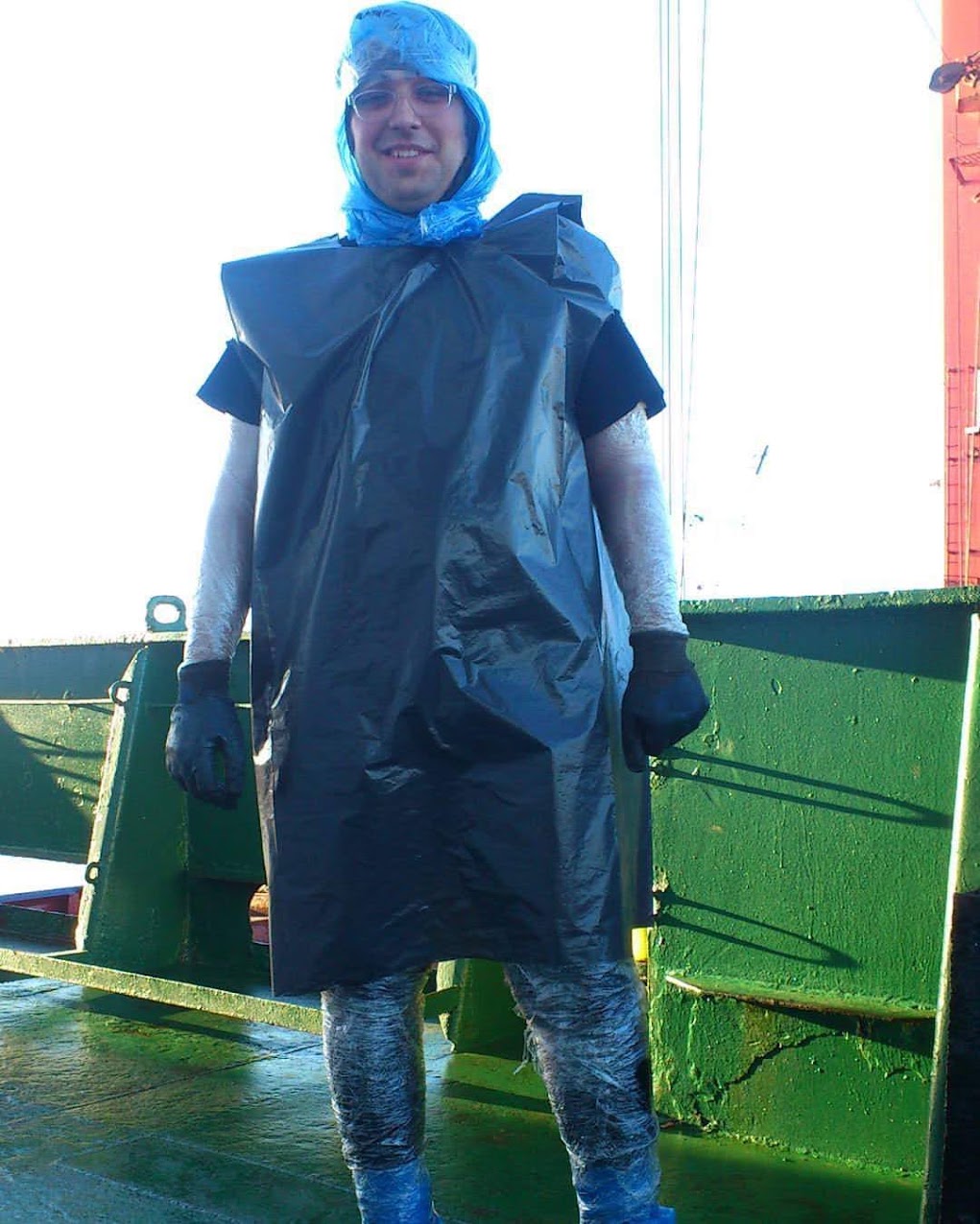 Wrapped in plastic sheeting before entering a scavenge space to clean it.